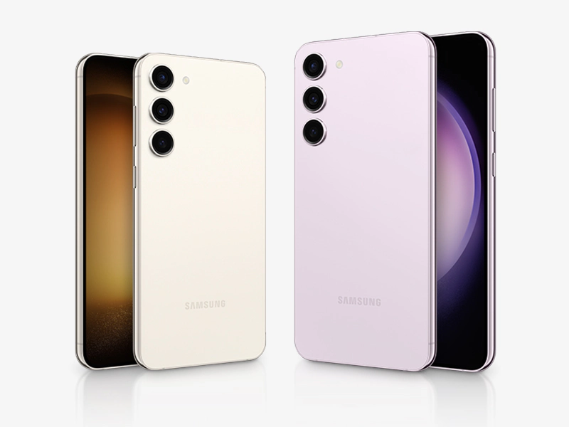 Samsung Galaxy S23 Plus showing Genshin Impact gameplay on high settings, held in hand indoors under bright lighting